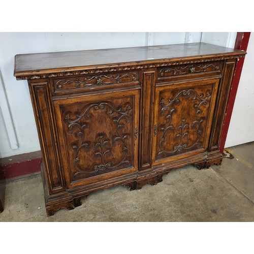 116 - An Italian Baroque style hardwood dresser