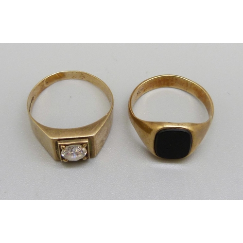 1016 - Two 9ct gold stone set rings, 6.2g, S and U