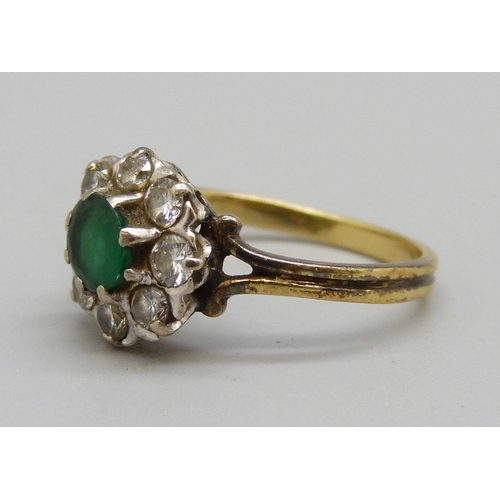 1024 - An 18ct gold, emerald and diamond cluster ring, 3.2g, N