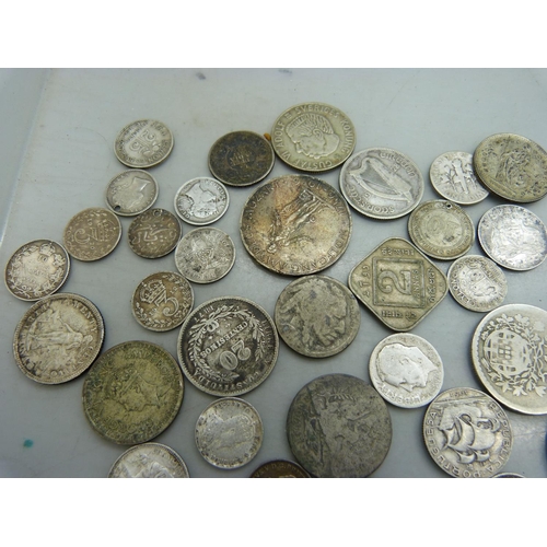 1027 - A collection of coins including an 1891 Hong Kong 5 cents and other silver coins