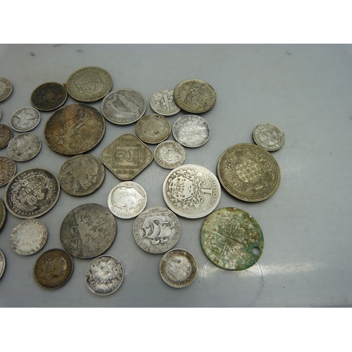 1027 - A collection of coins including an 1891 Hong Kong 5 cents and other silver coins