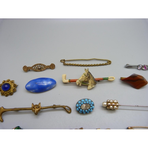 1028 - A collection of brooches, one lacking pin