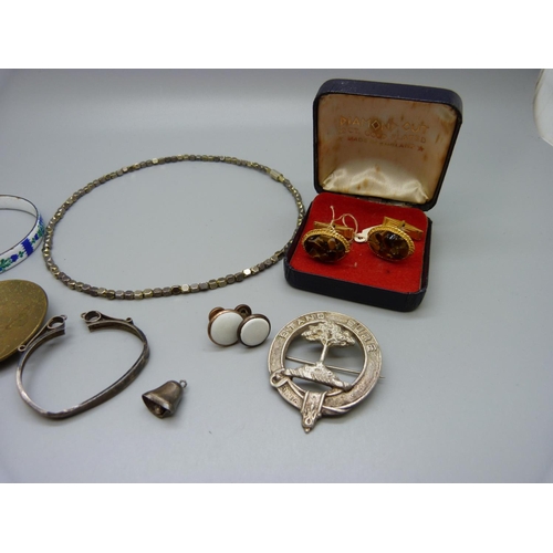 1040 - Two clan badges, caddy spoon, enamel bangle, etc.