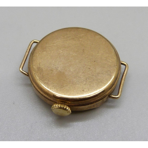 1064 - A 9ct gold wristwatch head, 25cm