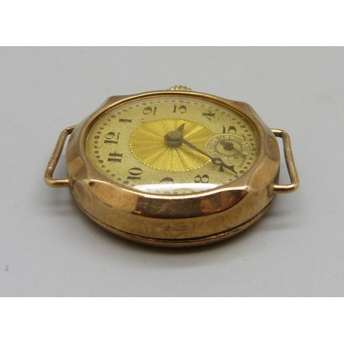 1064 - A 9ct gold wristwatch head, 25cm