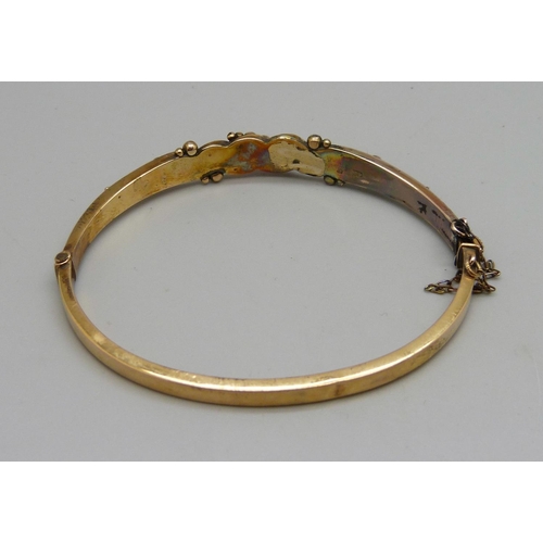 1086 - A 9ct gold bangle, 8.8g