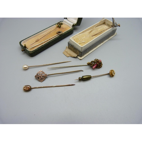 1088 - An old cut diamond set pheasant stick pin, a 15ct gold stick pin and other stick pins