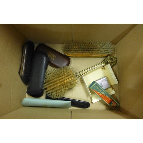 1103 - A gilt metal and glass dressing table set, six pairs of vintage spectacles and two lighters