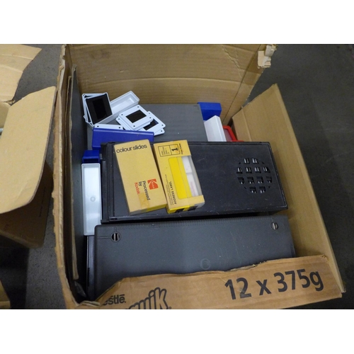 1144 - A collection of photo slides and three slide projectors **PLEASE NOTE THIS LOT IS NOT ELIGIBLE FOR P... 