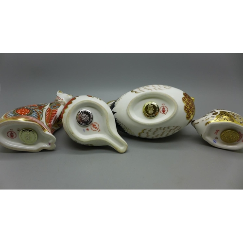 644 - Four Royal Crown Derby animal paperweights, Duck, Cat, Robin and Hedgehog, three with gold stoppers