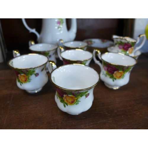 684 - A Royal Albert Old Country Roses coffee set, one saucer cracked