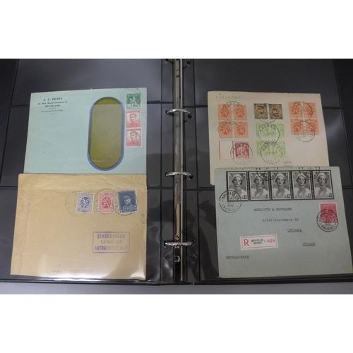 732 - Stamps;-Belgium postal history and first day covers in an album with a number of German Occupation i... 