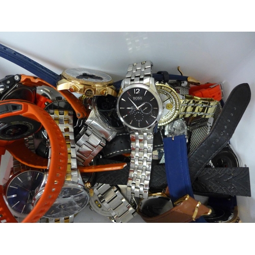 740 - A box of designer wristwatches, majority a/f (damaged glass, etc.)