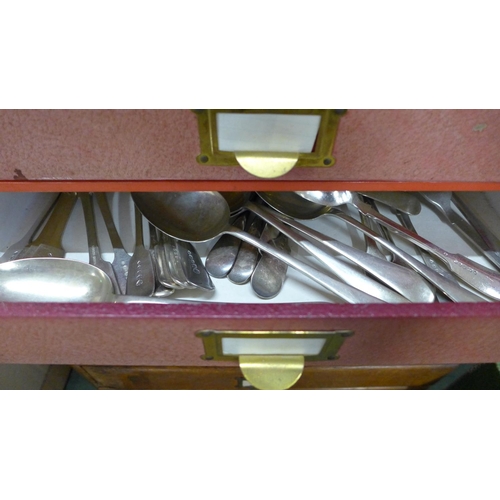 806 - Two cabinets, one wooden, containing a collection of flatware and two boxed sets of fish knives and ... 