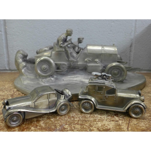 828 - A large vintage motor racing car inkwell, a/f, car table lighter and pin cushion