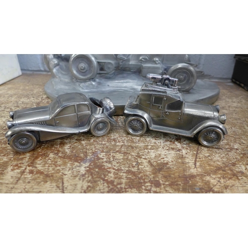 828 - A large vintage motor racing car inkwell, a/f, car table lighter and pin cushion