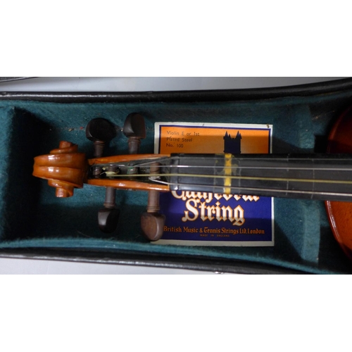 830 - A modern violin and bow, length of back 33.5cm, cased