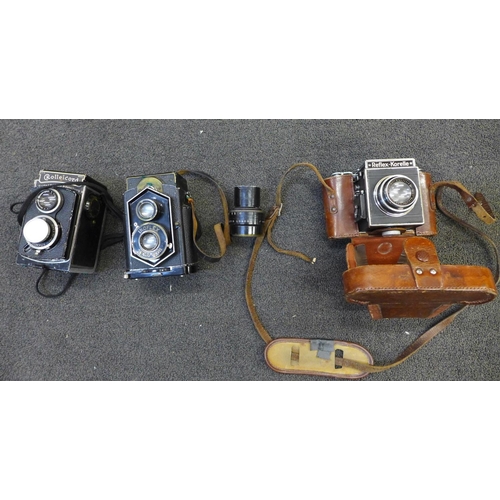 832 - Three cameras, Reflex-Korelle Rolleicord and Ikoflex Ziess/Ikon TLR cameras and a Dallmeyer London 6... 