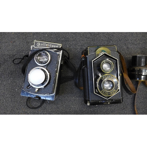 832 - Three cameras, Reflex-Korelle Rolleicord and Ikoflex Ziess/Ikon TLR cameras and a Dallmeyer London 6... 