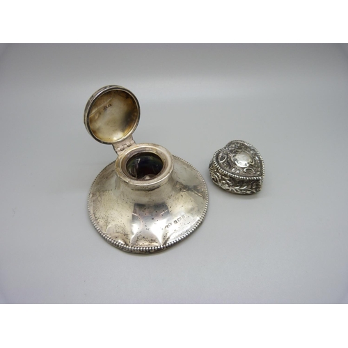 841 - A Victorian silver heart shaped box, Birmingham 1894 and a silver capstan inkwell, a/f