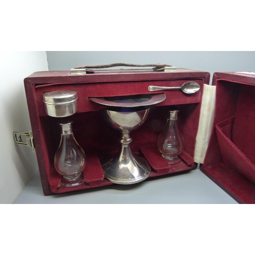 842 - A c1970 silver travelling communion set, 447g, personalised