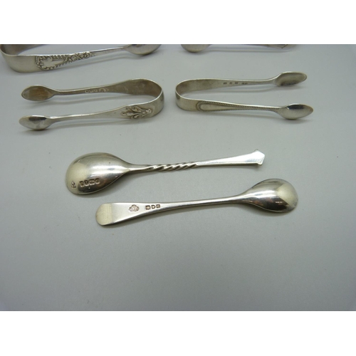 856 - Four pairs of silver sugar bows and two silver mustard spoons including one Victorian, 60g