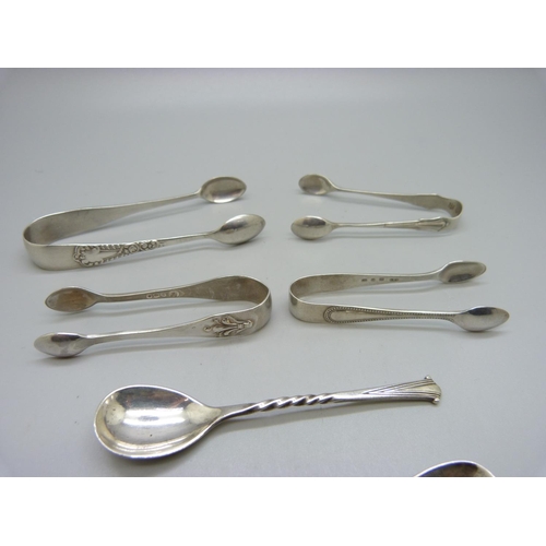 856 - Four pairs of silver sugar bows and two silver mustard spoons including one Victorian, 60g