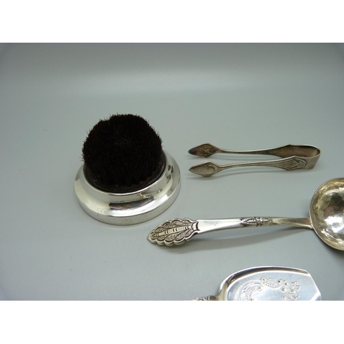 857 - A silver mounted pen wipe, an 830 silver Norwegian Mylius fork, a small ladle, etc.