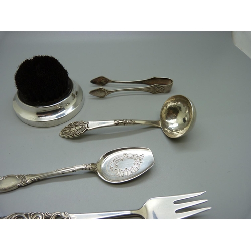 857 - A silver mounted pen wipe, an 830 silver Norwegian Mylius fork, a small ladle, etc.