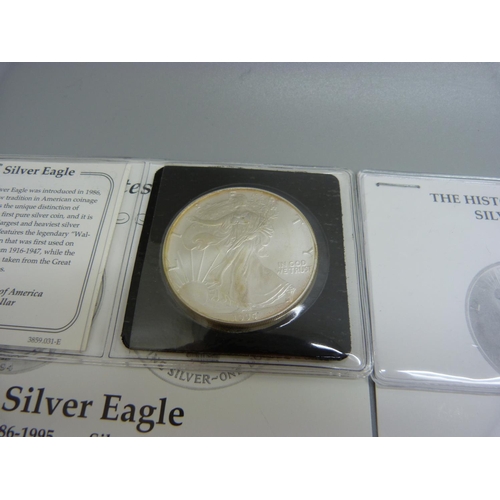 870 - Four 900 silver US $1 coins, with certificates