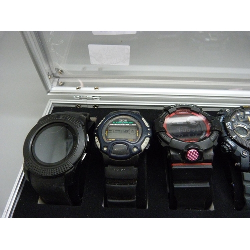 875 - A case of six wristwatches including Casio G-Shock x2