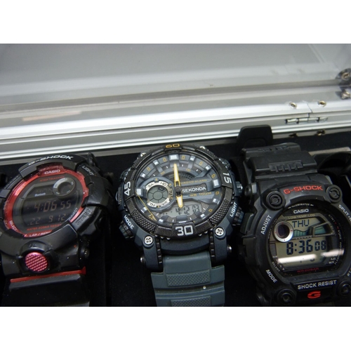 875 - A case of six wristwatches including Casio G-Shock x2