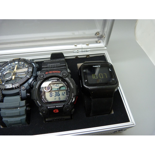 875 - A case of six wristwatches including Casio G-Shock x2