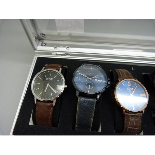 876 - A case of six wristwatches, all Hugo Boss