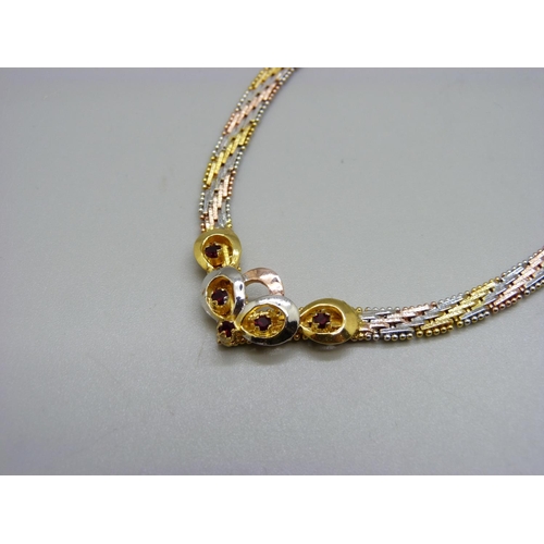 878 - A silver gilt necklace