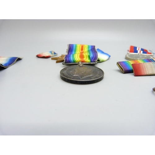 900 - A trio of WWI medals to 22081 Pte. F Johnson G. Gds., (served 1915 to 1924), Service and Pay Book, t... 