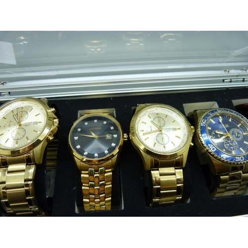 922 - A case of six wristwatches, Citizen, Guess, Boss and Hilfiger, (Hilfiger glass a/f)