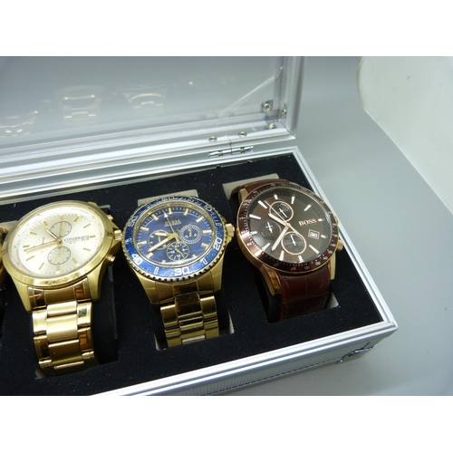 922 - A case of six wristwatches, Citizen, Guess, Boss and Hilfiger, (Hilfiger glass a/f)