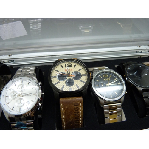 924 - Six fashion wristwatches, Boss, Hilfiger, etc.