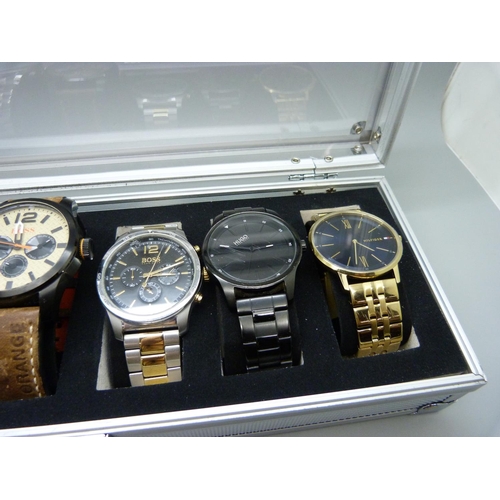 924 - Six fashion wristwatches, Boss, Hilfiger, etc.