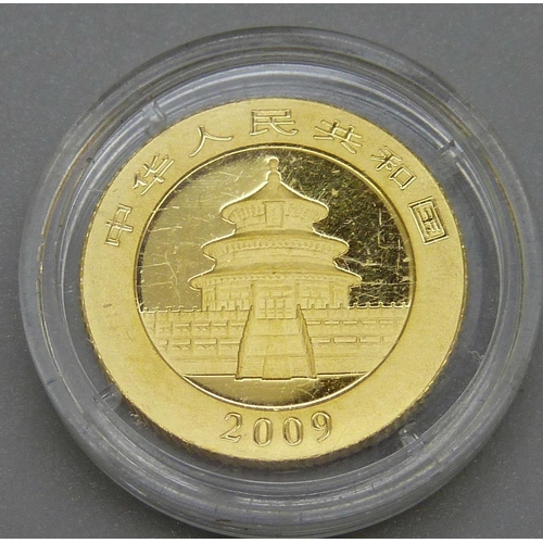 946 - A 2009 1/10oz .999 pure gold Chinese Panda coin, 3.1g