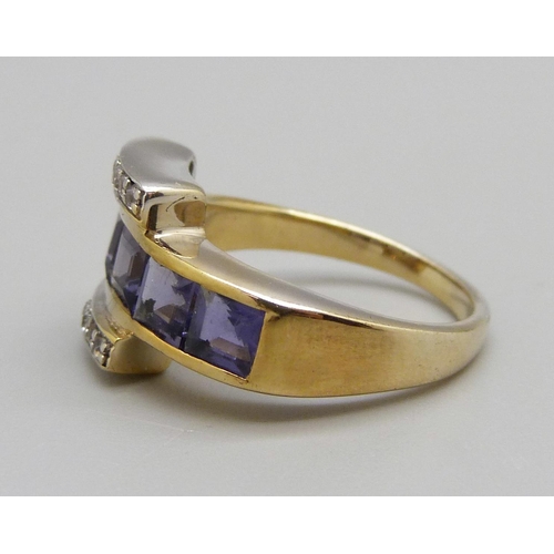 969 - A silver gilt, iolite set buckle ring, M