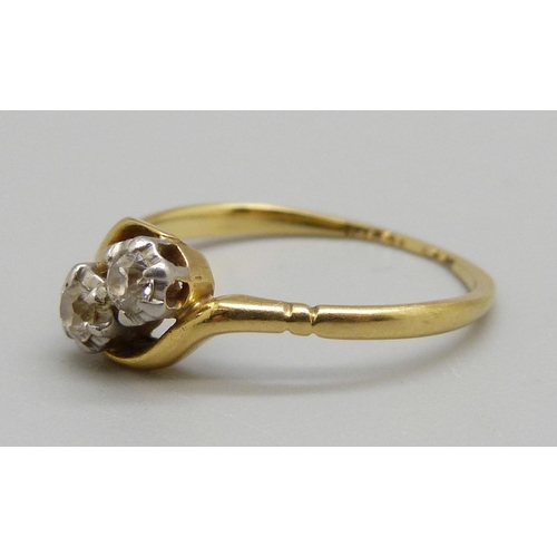 984 - An 18ct gold and platinum set two stone diamond ring, 2.5g, O