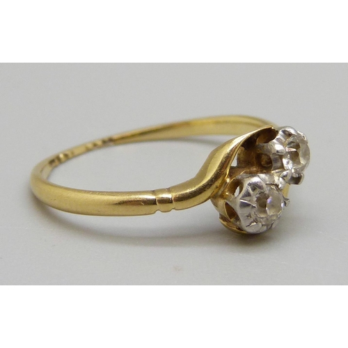 984 - An 18ct gold and platinum set two stone diamond ring, 2.5g, O