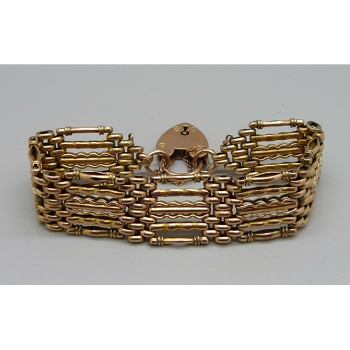 987 - A 9ct gold gate bracelet, 25.1g