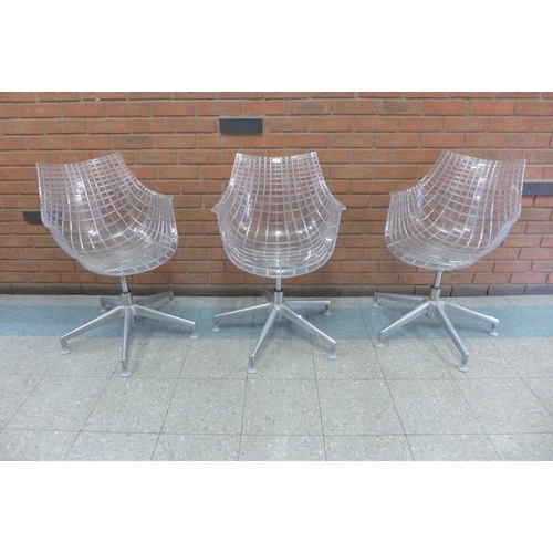 1 - A set of three Italian Driade Meridiana perspex and chrome revolving chairs, designed by Christophe ... 