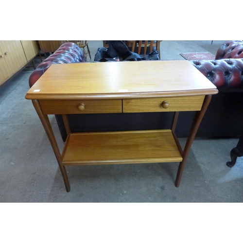 10 - A teak two drawer side table