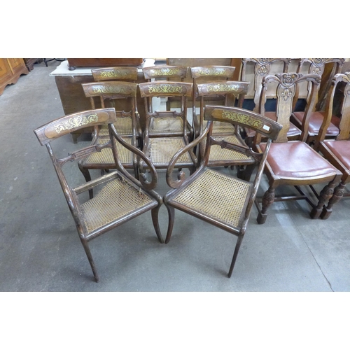 121 - A set of eight Regency rosewood and brass inlaid chairs, a/f