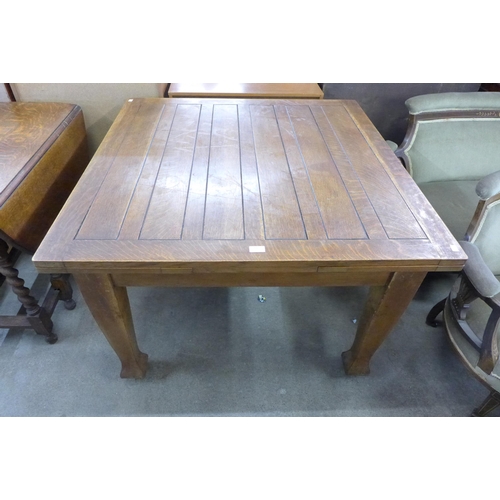 130 - An oak draw leaf table