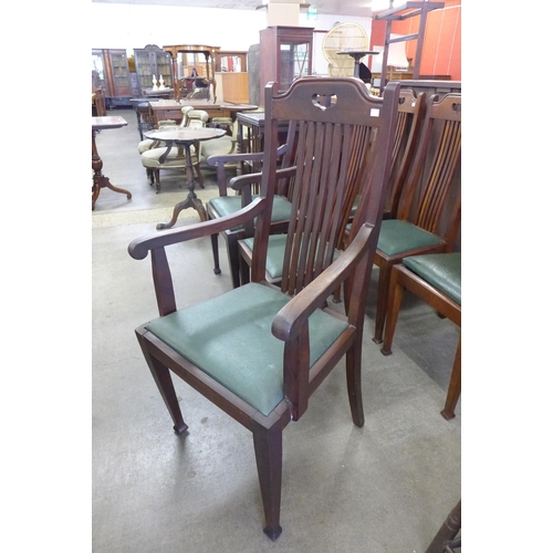 136 - A set of six Arts and Crafts mahogany dining chairs